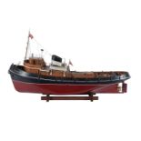 An award winning model of the live steam campaign tug 'Campaigner'