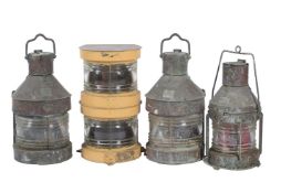 A collection of four copper ships navigation lamps