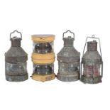 A collection of four copper ships navigation lamps