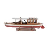 A model of a live steam powered Windermere/river launch 'Dolphin'