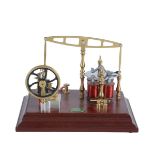 A model of an Old Model Company No 2 polished brass electronic driven beam engine