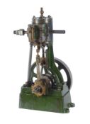 A vintage model of a Stuart Turner No 1 vertical live steam engine