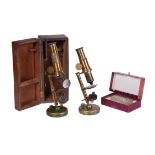 Two French brass student’s portable microscopes, unsigned, late 19th century