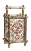 A gilt bamboo cased alarm carriage clock with porcelain panels, Paris, late 19th century