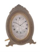 A large Victorian gilt oval strut timepiece, Thomas Cole for retail by Finnigans, London, circa 1860