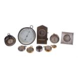 A collection of aneroid barometers and in varying states of repair, late 19th and early 20th century