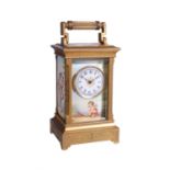 A Swiss porcelain inset gilt brass sub-miniature carriage timepiece , circa 1900