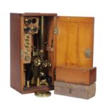 A Victorian lacquered brass binocular microscope, M. P. Tench, London, circa 1870