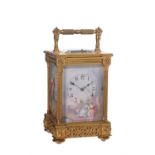 A French gilt carriage clock with porcelain panels, the movement stamped L.F., circa 1890