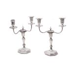 An Edwardian pair of two-branch silver candelabra by Hawksworth