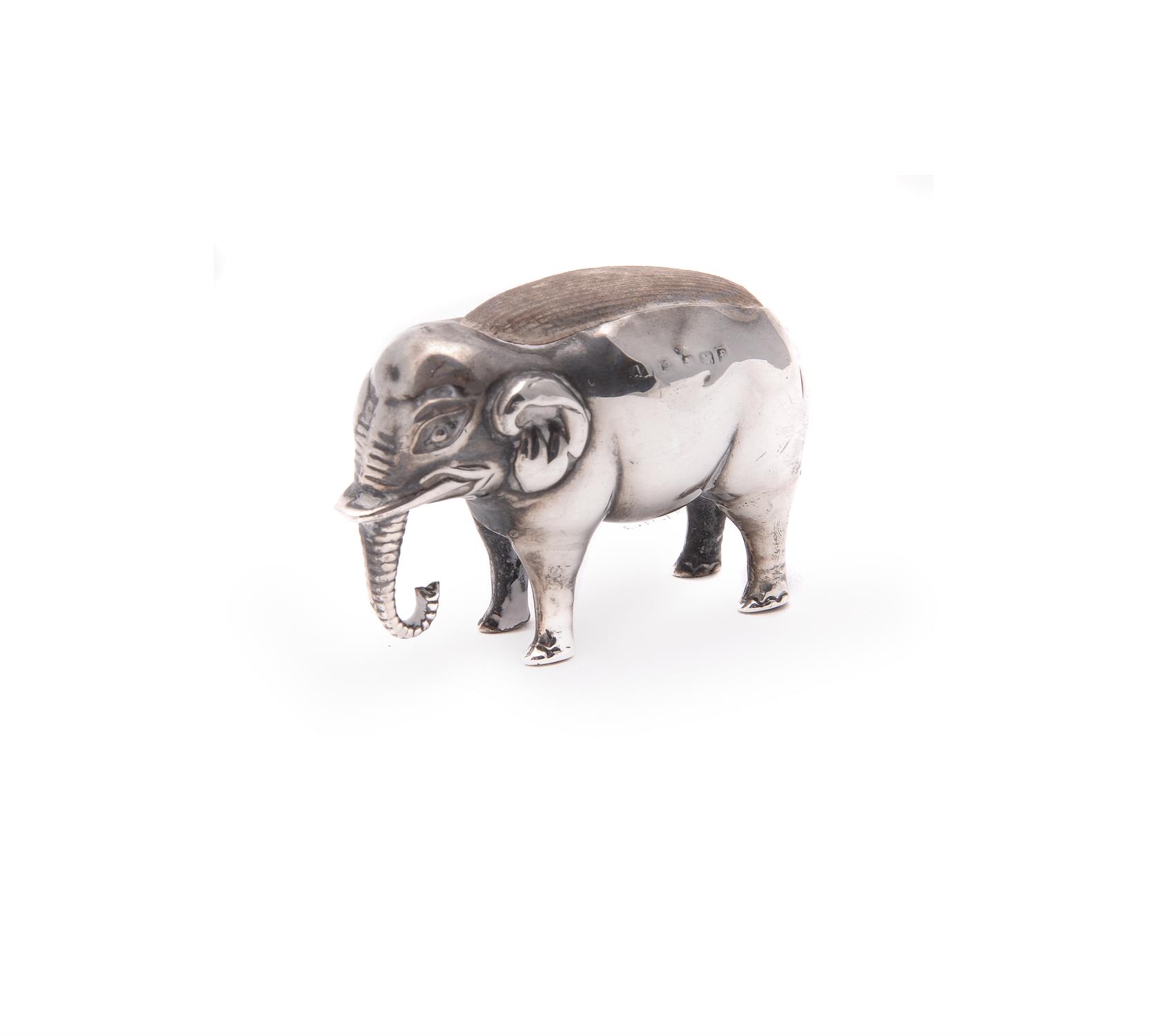 An Edwardian silver novelty elephant pin cushion by Adie & Lovekin Ltd.