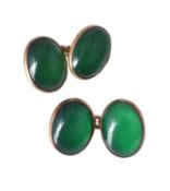 A pair of early 20th century green stone cufflinks