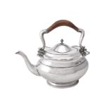 An Iranian oval tea pot