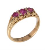 An 18 carat gold ruby and diamond ring