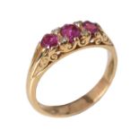 An 18 carat gold ruby and diamond ring