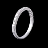 A diamond half eternity ring