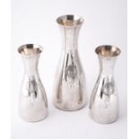 A set of three Italian silver coloured wine carafes by Brandimarte