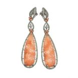 A pair of orange jadeite, green garnet and citrine pendant earrings by Bochic, New York