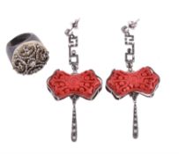 A pair of cinnabar lacquer, diamond and black diamond pendent earrings by Bochic, New York