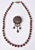 An early 20th century garnet necklace