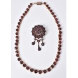 An early 20th century garnet necklace
