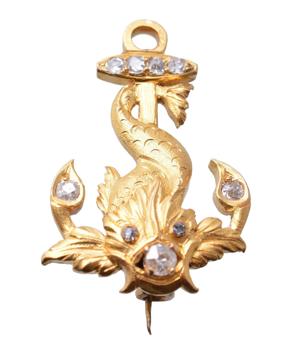 A diamond dolphin and anchor brooch