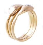 An 18 carat gold and diamond snake ring