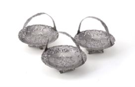 A set of three graduated silver and niello sweet baskets