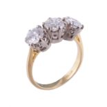 An 18 carat gold diamond three stone ring