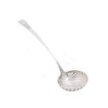 A George III silver shell bowl soup ladle by George Smith III