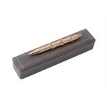 Van Cleef & Arpels, a gold coloured bamboo ball point pen