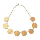 A gold coloured coin necklace