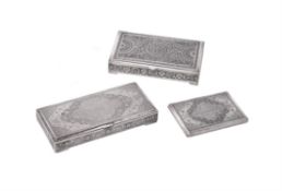 Three Iranian silver rectangular boxes