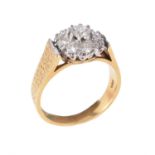 An 18 carat gold diamond cluster ring