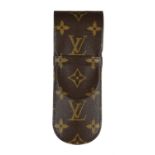 Louis Vuitton, a black lacquer rollerball pen and leather monogram pen holder