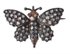 A diamond butterfly brooch