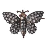 A diamond butterfly brooch