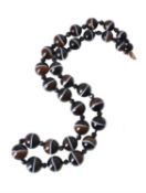 A Victorian banded onyx bead necklace