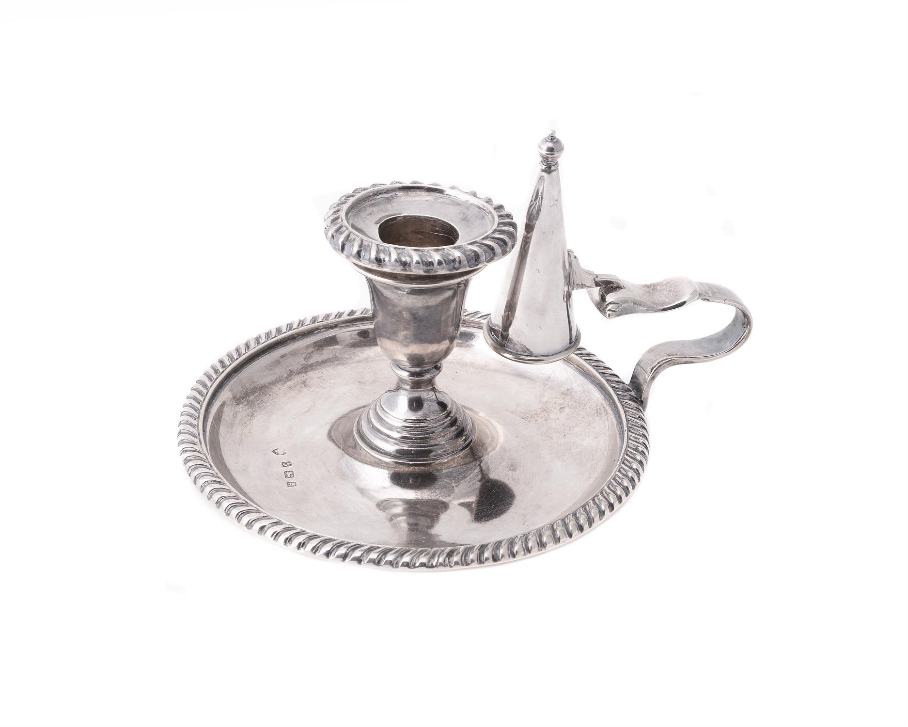 An Edwardian silver circular chamberstick by Williams (Birmingham) Ltd