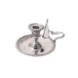 An Edwardian silver circular chamberstick by Williams (Birmingham) Ltd