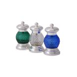 Three coloured glass and electro-plated pepper grinders retailed by Annabel Jones
