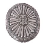 An Ottoman silver coloured small shaped oval mirror