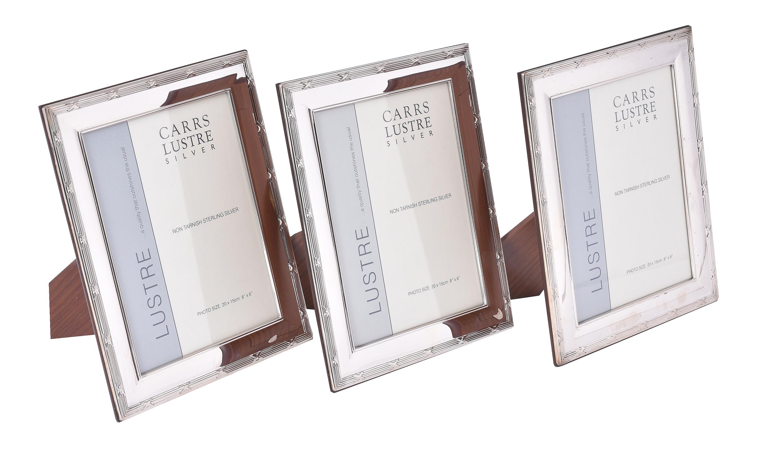 Three silver mounted rectangular photo frames by Carr's of Sheffield Ltd.