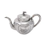 A Chinese export silver tea pot