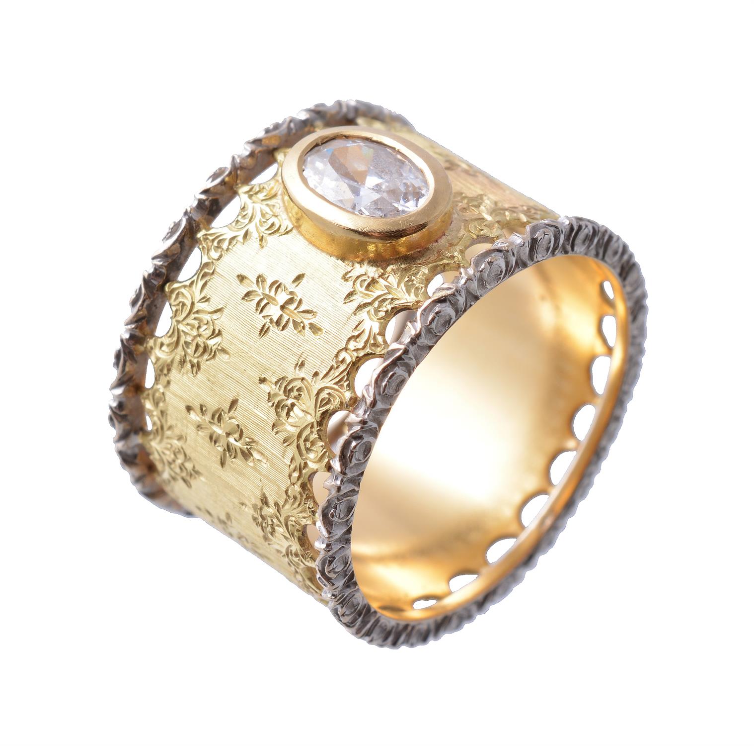 A gold coloured ring by Mario Buccellati