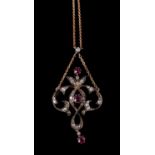 An Edwardian diamond and ruby pendant
