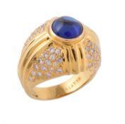 A sapphire and diamond bombé ring