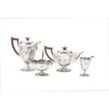 A silver shaped oval four piece tea set by Mappin & Webb