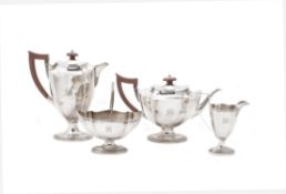 A silver shaped oval four piece tea set by Mappin & Webb