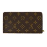 Louis Vuitton, a leather monogrammed purse